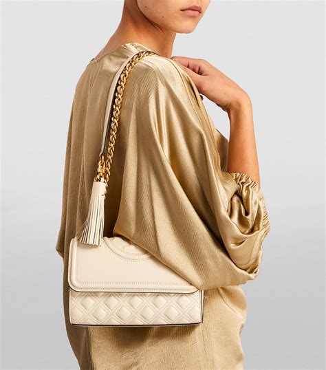 tory burch vs ysl|Tory Burch shoulder bag.